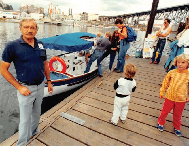 false creek ferries owner george mcinnis standing on a ferry dock