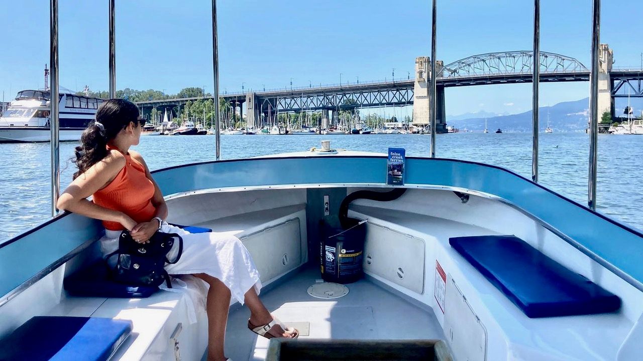 a covered electric tour boat operated by faslsecreek ferries